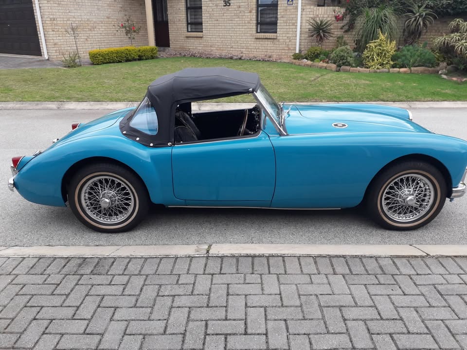 Full side profile of the MGA with the hood up