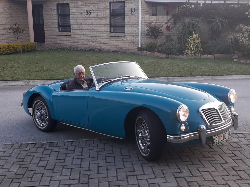 Flip van der Merwe at the wheel of the MGA in his driveway
